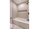 Bathroom with a bathtub, shower, and hexagon tile floor at 1111 Barrett Rd, Charleston, SC 29407