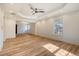 Bright bedroom with hardwood floors and ceiling fan at 1111 Barrett Rd, Charleston, SC 29407
