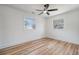 Bright bedroom with wood flooring and ceiling fan at 1111 Barrett Rd, Charleston, SC 29407