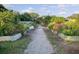 Community garden with raised beds and a walking path at 1111 Barrett Rd, Charleston, SC 29407
