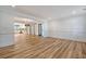 Bright dining room with hardwood floors and kitchen access at 1111 Barrett Rd, Charleston, SC 29407