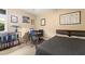 Bedroom with double bed, workspace, and book shelf at 1240 Fairmont Ave # 1, Mount Pleasant, SC 29464