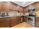 Modern kitchen with stainless steel appliances and granite countertops at 1240 Fairmont Ave # 1, Mount Pleasant, SC 29464