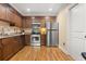 Eat-in kitchen with stainless steel appliances and hardwood floors at 1240 Fairmont Ave # 1, Mount Pleasant, SC 29464