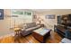 Cozy living room with hardwood floors and a large flat-screen TV at 1240 Fairmont Ave # 1, Mount Pleasant, SC 29464