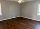 Spacious bedroom with hardwood floors and neutral walls at 206 Dora Dr, Saint George, SC 29477