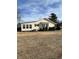 House exterior showcasing back and side views at 206 Dora Dr, Saint George, SC 29477