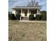 House with front porch and brick steps at 206 Dora Dr, Saint George, SC 29477