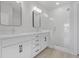 Spa-like bathroom with double vanity, large mirrors, and glass shower at 2129 Blue Bayou Blvd, Johns Island, SC 29455