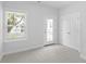 Bright bedroom with carpet, French door, and closet at 2129 Blue Bayou Blvd, Johns Island, SC 29455