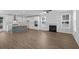 Spacious living area with hardwood floors and a fireplace at 2129 Blue Bayou Blvd, Johns Island, SC 29455