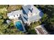 Aerial view of a home with a pool and metal roof at 222 Haddrell St, Mount Pleasant, SC 29464