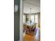 Formal dining room featuring a large table, chandelier, and hardwood floors at 222 Haddrell St, Mount Pleasant, SC 29464