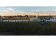 Private dock with seating area at sunset at 222 Haddrell St, Mount Pleasant, SC 29464