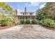 Two-story home with screened porch and brick driveway at 222 Haddrell St, Mount Pleasant, SC 29464
