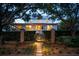 Charming home with landscaped yard and brick walkway at 222 Haddrell St, Mount Pleasant, SC 29464
