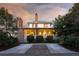 Elegant two-story home with brick accents and porch at 222 Haddrell St, Mount Pleasant, SC 29464
