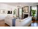Open living room featuring a sectional sofa and a large TV at 222 Haddrell St, Mount Pleasant, SC 29464