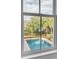 View of a private pool and backyard from a window at 222 Haddrell St, Mount Pleasant, SC 29464