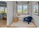 Cozy reading nook with built-in window seat and comfortable armchair at 222 Haddrell St, Mount Pleasant, SC 29464