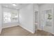 Spacious bedroom with hardwood floors and access to another room at 2253 Blue Bayou Blvd, Johns Island, SC 29455