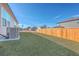 Spacious backyard with grassy area and wooden fence at 286 W Bradford Pointe Dr, Summerville, SC 29486