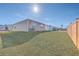 Spacious backyard with a wooden fence and grassy lawn at 286 W Bradford Pointe Dr, Summerville, SC 29486