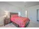 Well lit bedroom with a queen bed and ensuite bathroom at 286 W Bradford Pointe Dr, Summerville, SC 29486