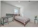 Bedroom with striped bedspread and built-in workspace at 286 W Bradford Pointe Dr, Summerville, SC 29486