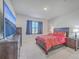 Spacious bedroom with large TV and dark brown dresser at 286 W Bradford Pointe Dr, Summerville, SC 29486