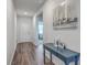Bright entryway with wood-look floors and a blue console table at 286 W Bradford Pointe Dr, Summerville, SC 29486