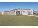 Gray house with white columns and a two-car garage, featuring a well-manicured lawn at 286 W Bradford Pointe Dr, Summerville, SC 29486