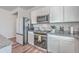 Bright kitchen with stainless steel appliances and granite countertops at 286 W Bradford Pointe Dr, Summerville, SC 29486