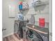 Laundry room with washer, dryer, and overhead shelving at 286 W Bradford Pointe Dr, Summerville, SC 29486