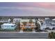 Elevated view of beach home and surrounding neighborhood at 309 Palmetto Blvd, Edisto Island, SC 29438
