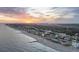 Beachfront homes at sunset, aerial view at 309 Palmetto Blvd, Edisto Island, SC 29438
