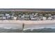 Aerial view of beachfront homes with ocean views at 309 Palmetto Blvd, Edisto Island, SC 29438