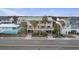 Beach house and neighborhood, aerial view at 309 Palmetto Blvd, Edisto Island, SC 29438