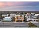 Elevated view of beach house at sunset at 309 Palmetto Blvd, Edisto Island, SC 29438