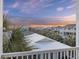 Elevated balcony showcasing a scenic neighborhood view at 309 Palmetto Blvd, Edisto Island, SC 29438