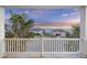 Relaxing balcony overlooking the ocean and beach homes at 309 Palmetto Blvd, Edisto Island, SC 29438