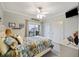 Bedroom with ocean views and sliding glass doors at 309 Palmetto Blvd, Edisto Island, SC 29438
