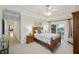 Bedroom with wooden bed frame and ocean view at 309 Palmetto Blvd, Edisto Island, SC 29438