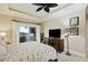 Bedroom with water view and sliding glass doors at 309 Palmetto Blvd, Edisto Island, SC 29438