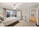 Bright bedroom with a comfortable bed and access to a hallway at 309 Palmetto Blvd, Edisto Island, SC 29438