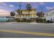 Beachfront home exterior with ample parking and ocean views at 309 Palmetto Blvd, Edisto Island, SC 29438