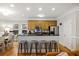 Updated kitchen featuring stainless steel appliances and breakfast bar at 309 Palmetto Blvd, Edisto Island, SC 29438