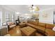 Comfortable living room, leather sectional sofa and wood floors at 309 Palmetto Blvd, Edisto Island, SC 29438