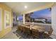 Large covered porch with outdoor dining set and ocean views at 309 Palmetto Blvd, Edisto Island, SC 29438