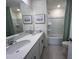 Bathroom with double vanity, bathtub, and shower at 413 Trotters Ln, Moncks Corner, SC 29461